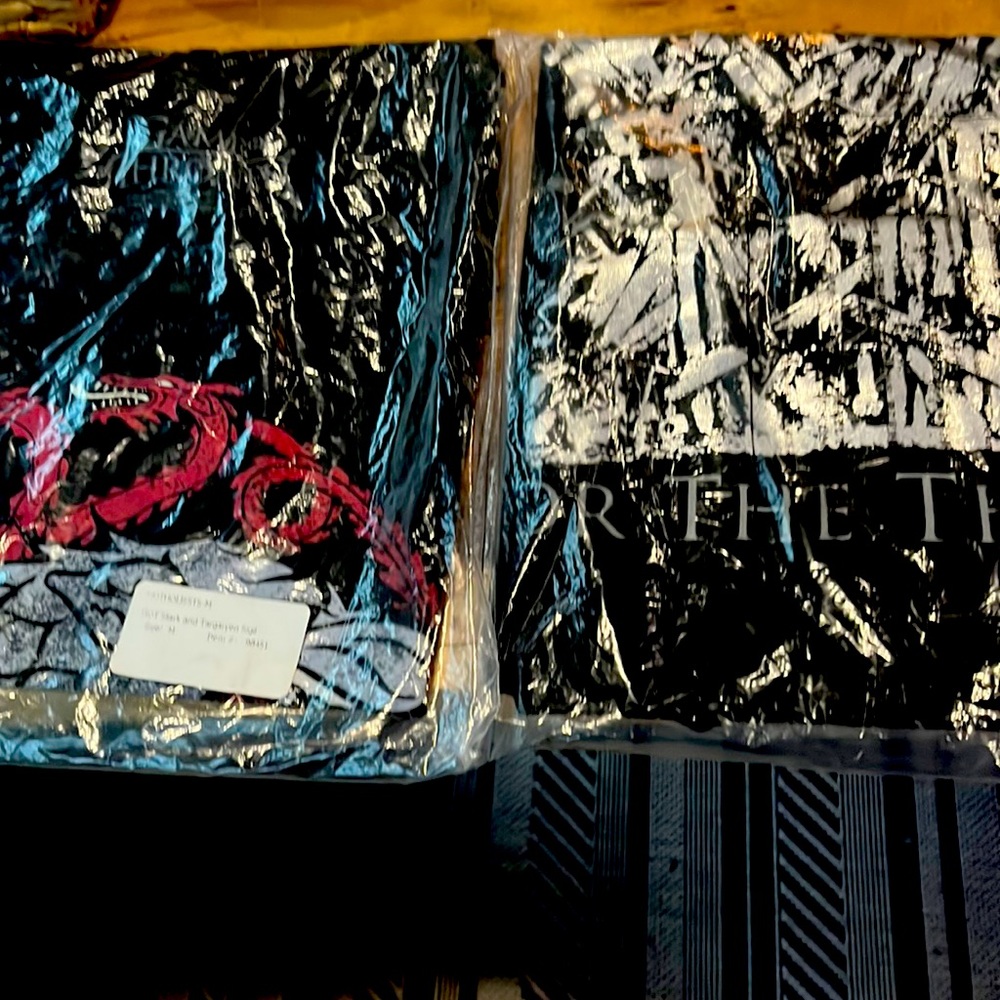 Game of thrones tee shirts. Size medium. Got stark and Four the Throne new